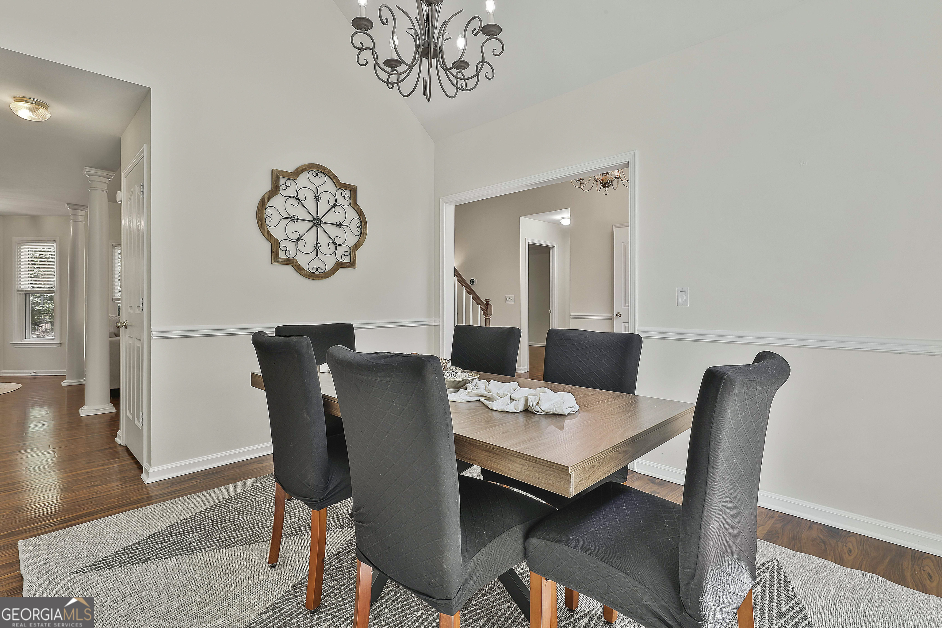 244 Terrane Ridge Peachtree City, GA 30269 - Photo 6 of 44 a view of a dining room with furniture and wooden floor