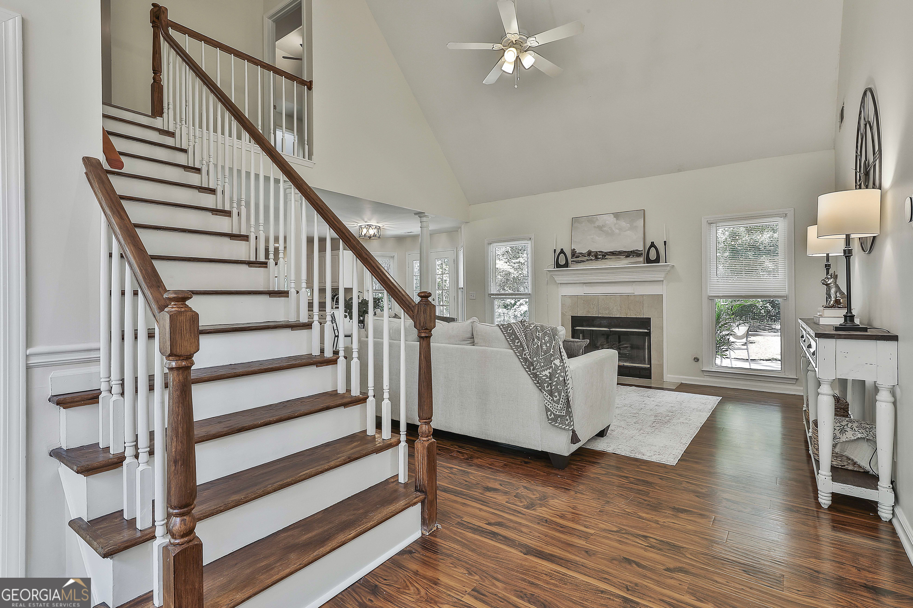 244 Terrane Ridge Peachtree City, GA 30269 - Photo 7 of 44 a view of entryway livingroom and hall with wooden floor