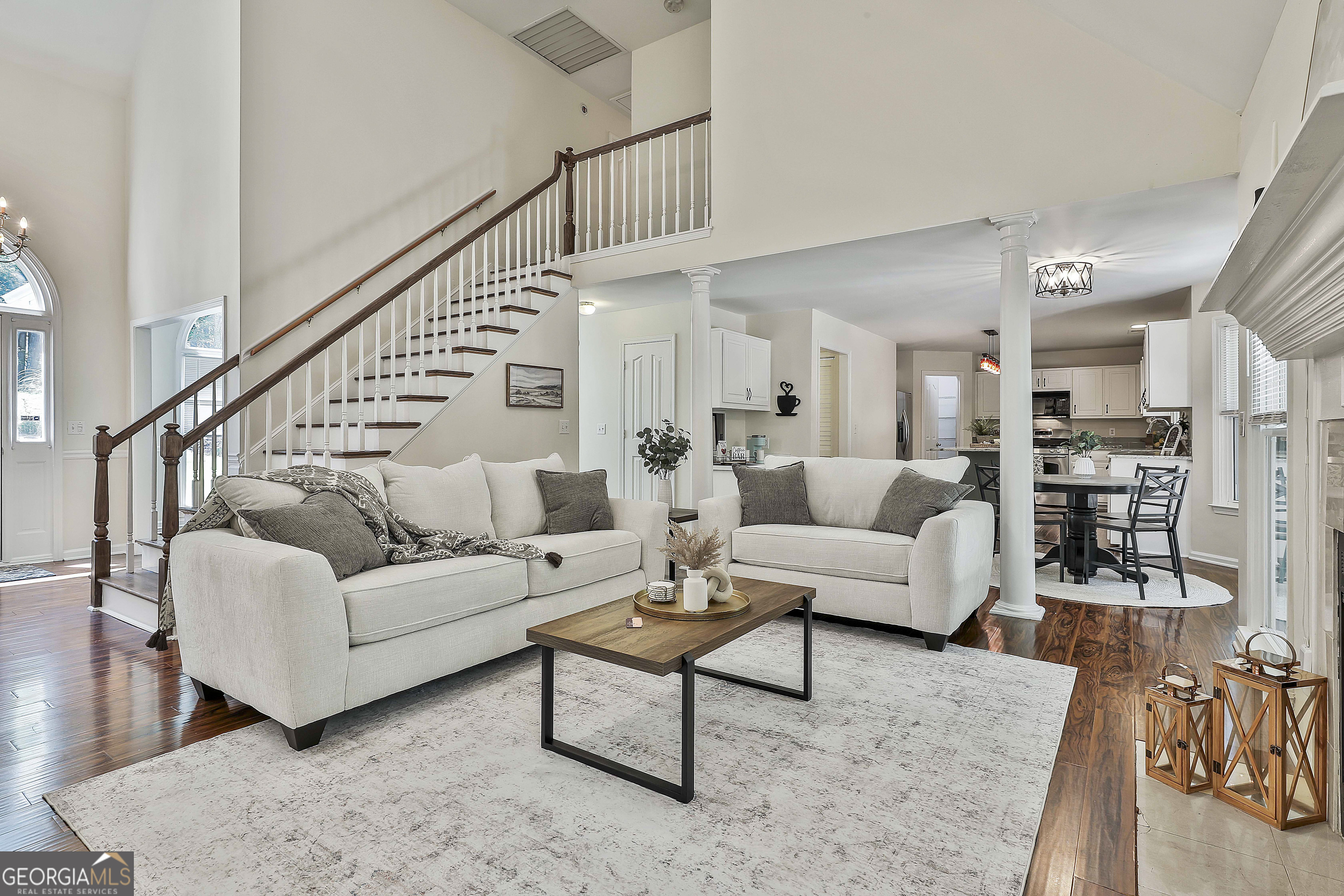 244 Terrane Ridge Peachtree City, GA 30269 - Photo 10 of 44 a living room with furniture and a view of kitchen