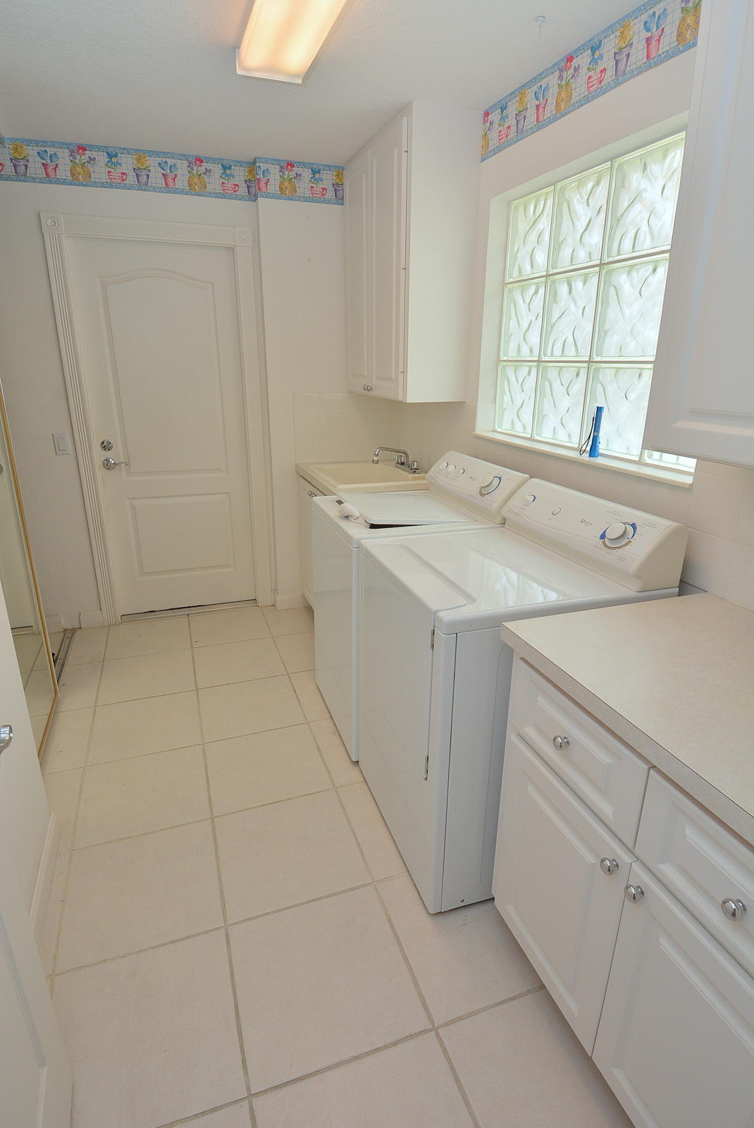 1038 Southwest Balmoral Trace Stuart, FL 34997 - Photo 36 of 58 Laundry