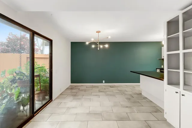 a view of a room with window and stairs