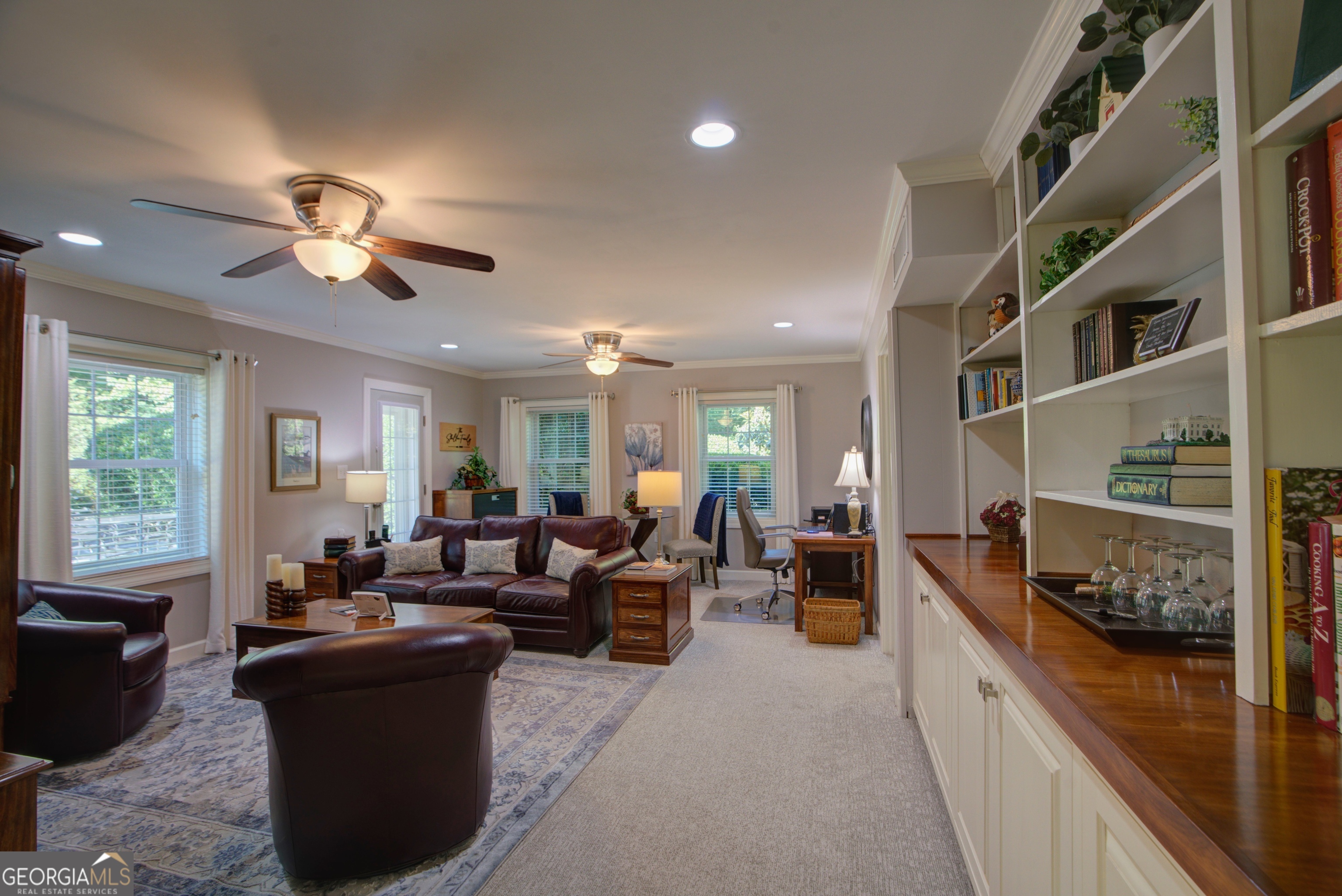 204 Green View Road Southwest Rome, GA 30165 - Photo 56 of 62 a living room with furniture and a chandelier