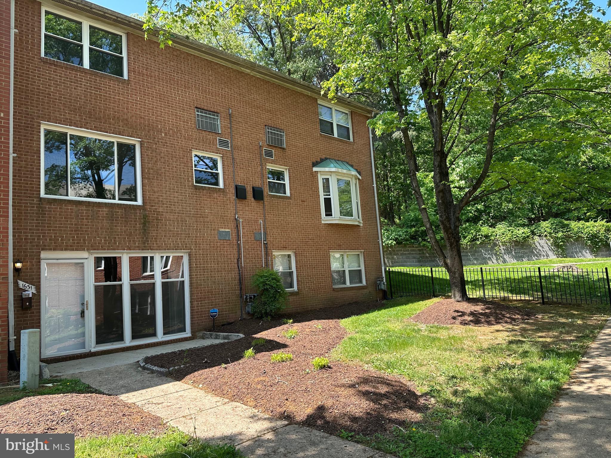 1631 Addison Road South, Unit 1631 District Heights, MD 20747 - Photo 1 of 1 a house view with a garden space