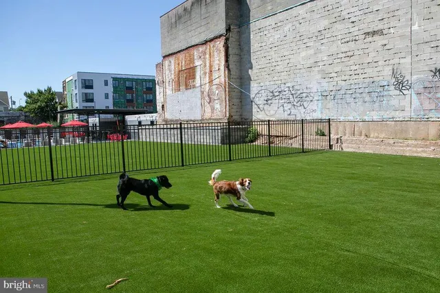 a view of living room with wooden floor
