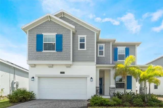 a front view of a house with balcony