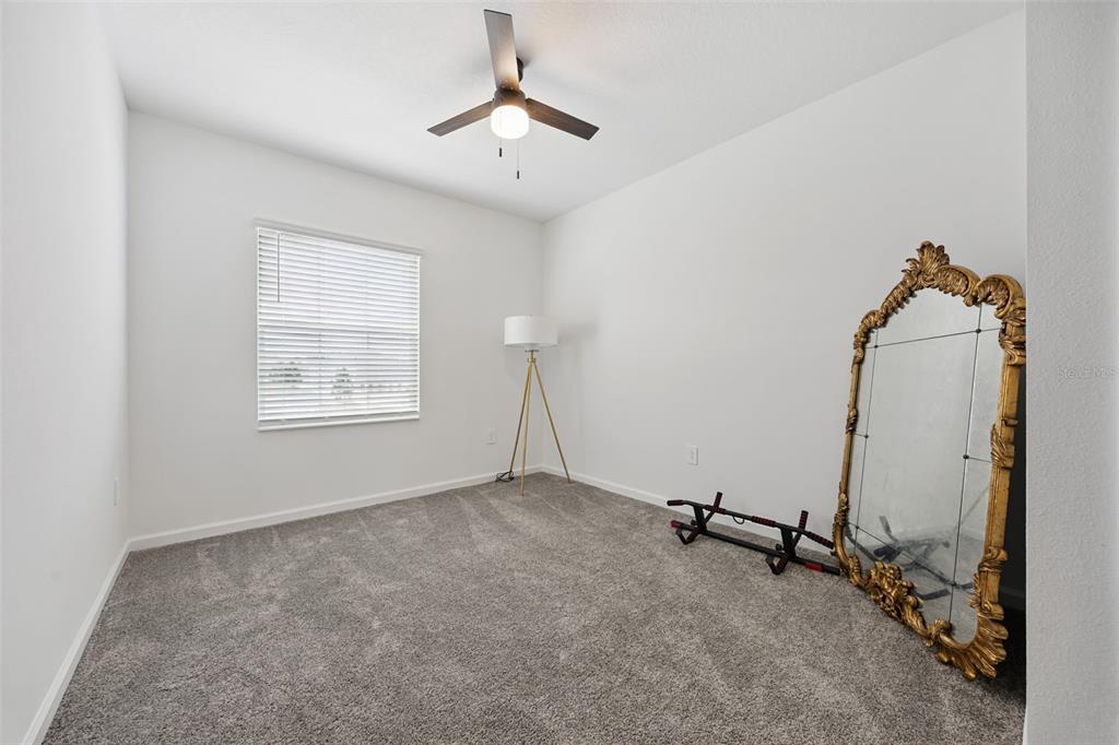 2747 Slash Way St. Cloud, FL 34771 - Photo 33 of 62 an empty room with windows