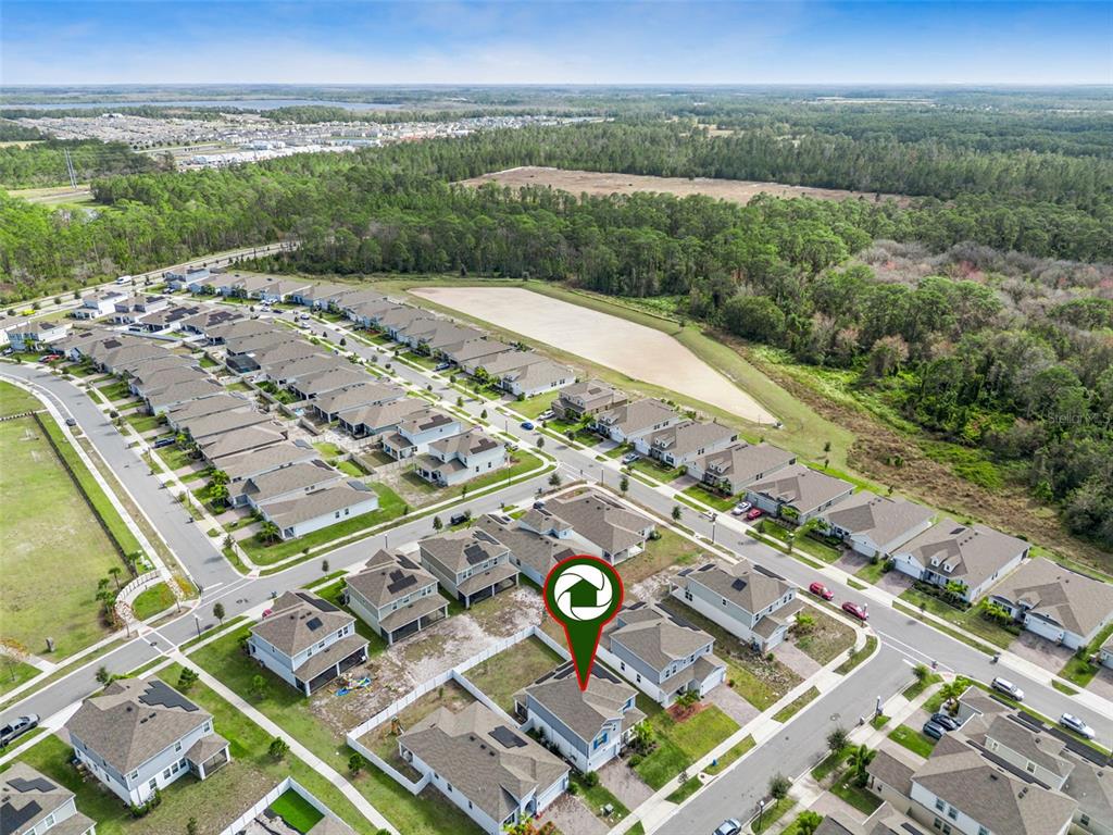 2747 Slash Way St. Cloud, FL 34771 - Photo 50 of 62 a view of a city with a mountain