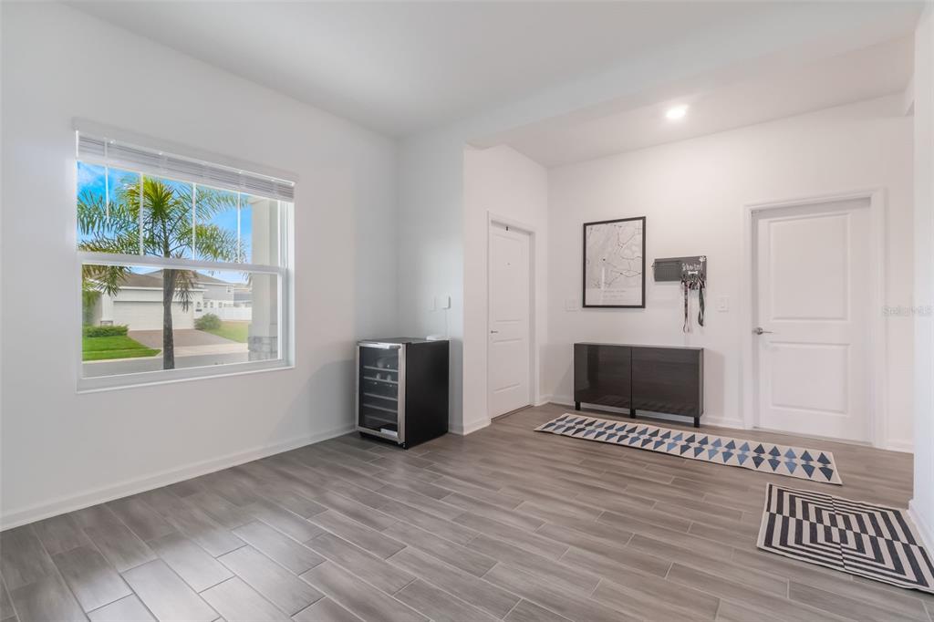 2747 Slash Way St. Cloud, FL 34771 - Photo 8 of 62 a bedroom with furniture and window