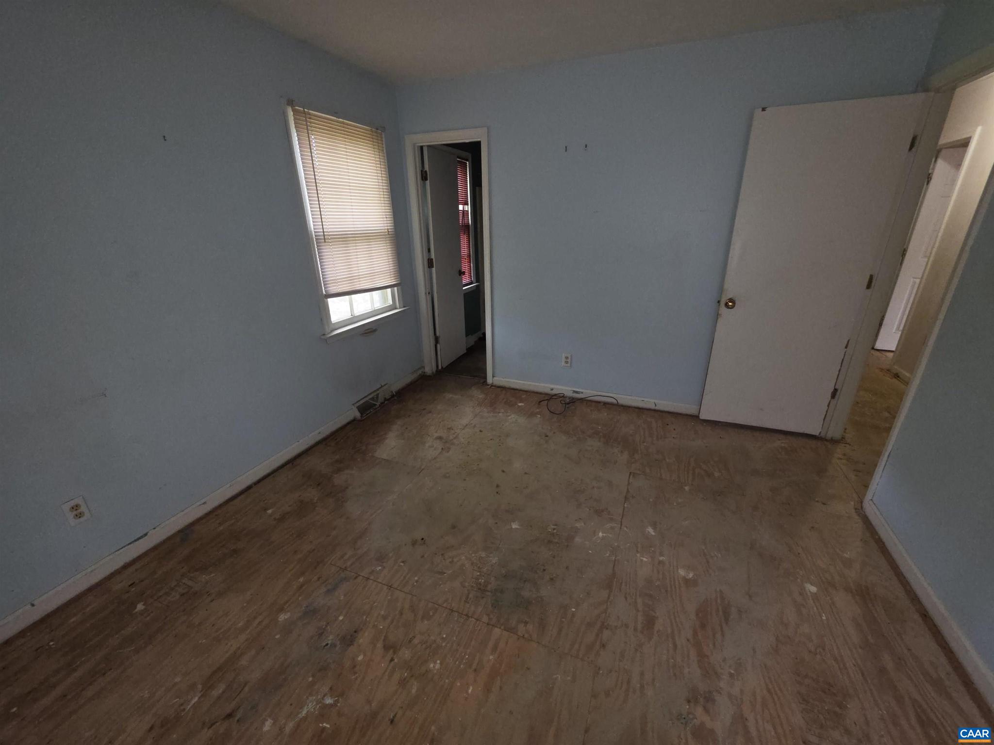 1506 Trailridge Road Charlottesville, VA 22903 - Photo 7 of 15 a view of an empty room with a window