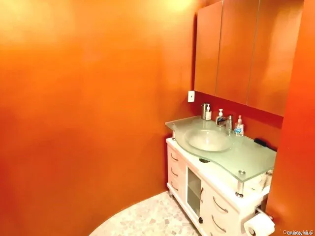a bathroom with a tub and shower