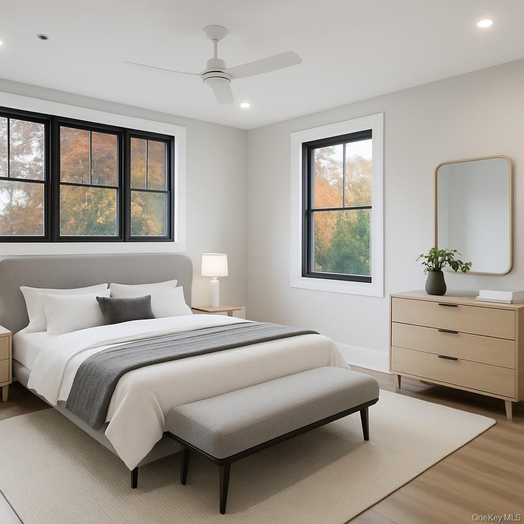 34 Clinton Avenue, Unit 9 Dobbs Ferry, NY 10522 - Photo 7 of 13 a bedroom with a large bed and a window