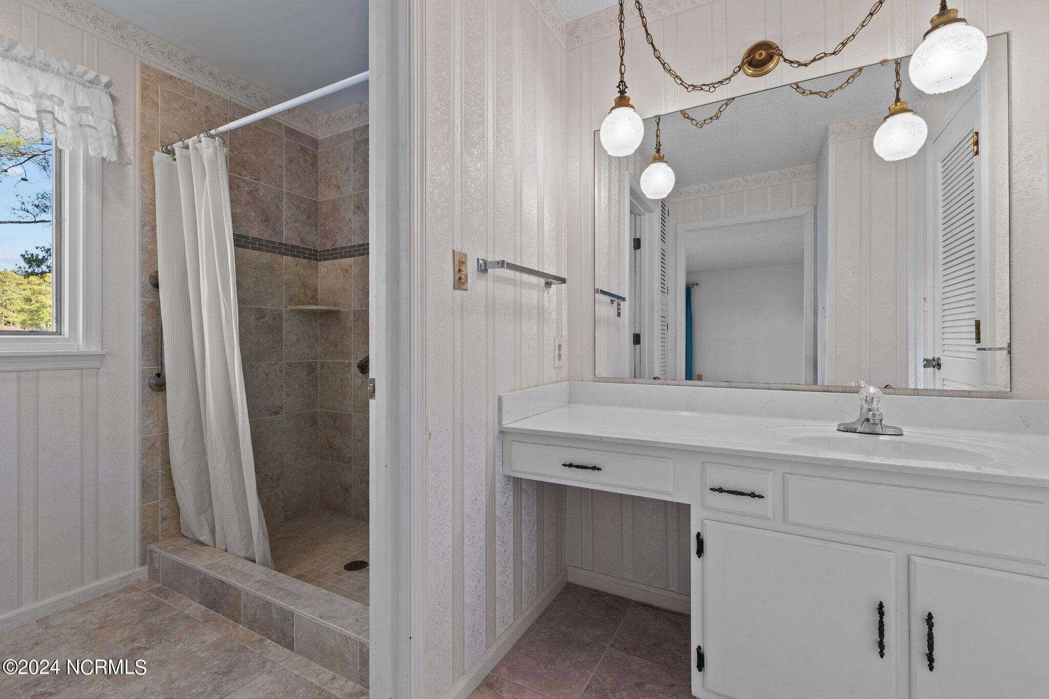 39 Shadow Drive Whispering Pines, NC 28327 - Photo 14 of 26 Primary Bath