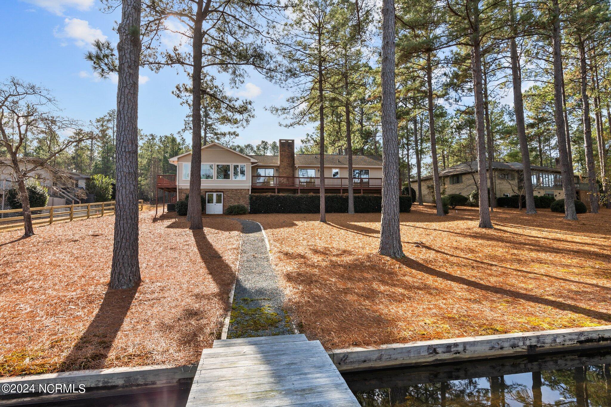 39 Shadow Drive Whispering Pines, NC 28327 - Photo 19 of 26 From Lake