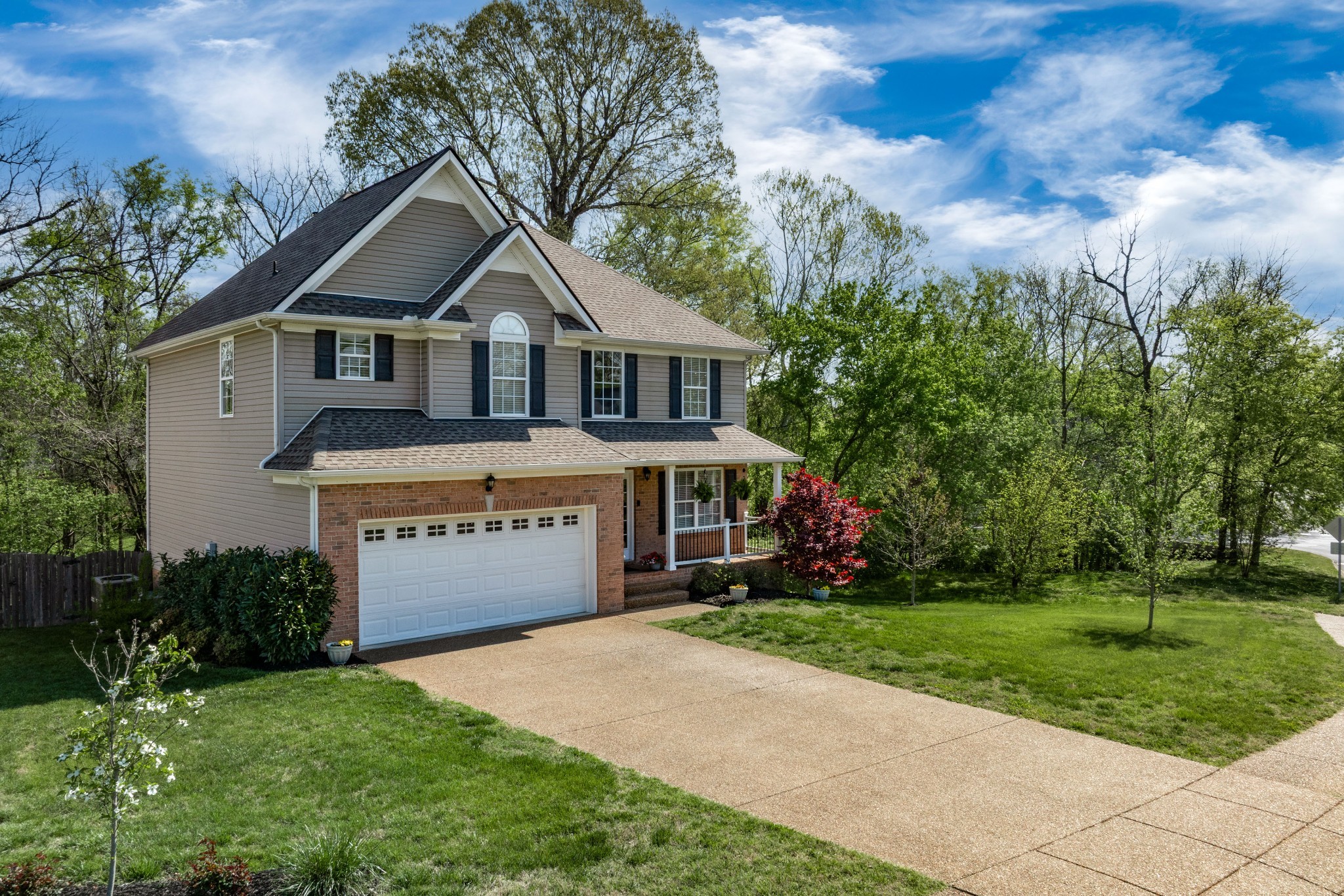 2102 Burgess Lane Spring Hill, TN 37174 - Photo 40 of 45 a front view of a house with a yard