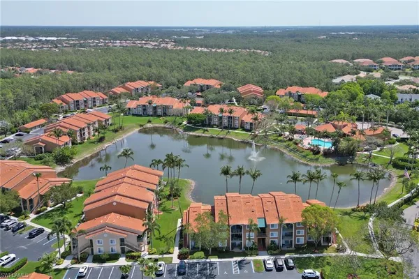 a view of lake and houses with outdoor space