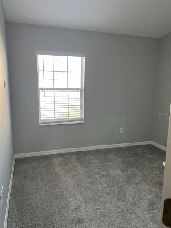 6407 Barksdale Way Riverview, FL 33578 - Photo 13 of 18 an empty room with a window