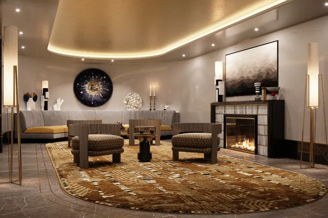 a view of a lobby with furniture and refrigerator