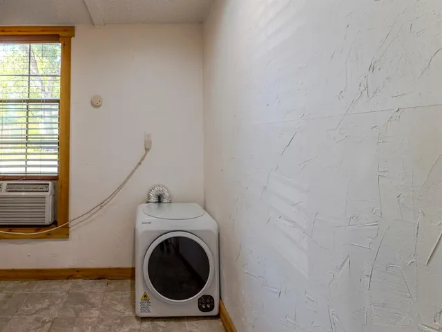 a room with a washer and dryer