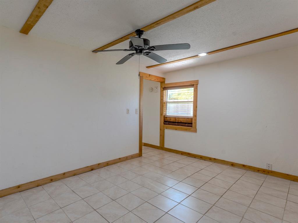 422 Washington Street Grapevine, TX 76051 - Photo 4 of 16 a view of an empty room and window