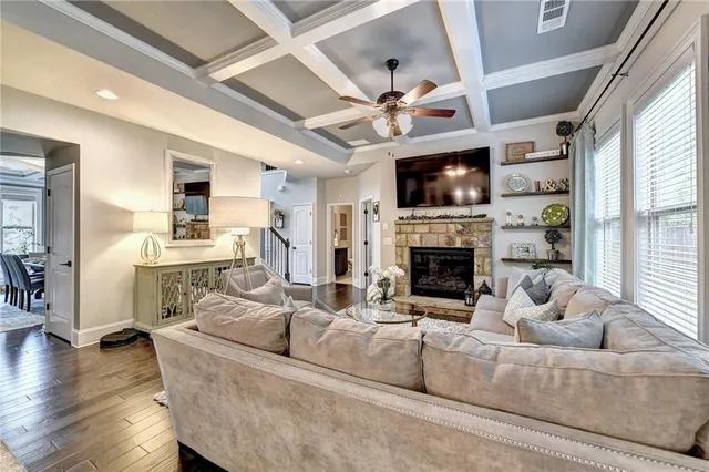 a kitchen with granite countertop cabinets stainless steel appliances and a counter space
