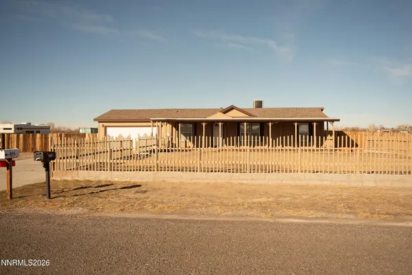 a view of a swimming pool and an outdoor space
