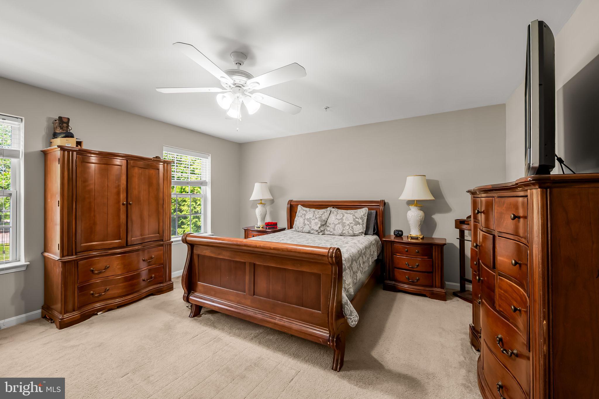 6008 Hanover Road Elkridge, MD 21075 - Photo 26 of 36 a bed room with a bed and a television