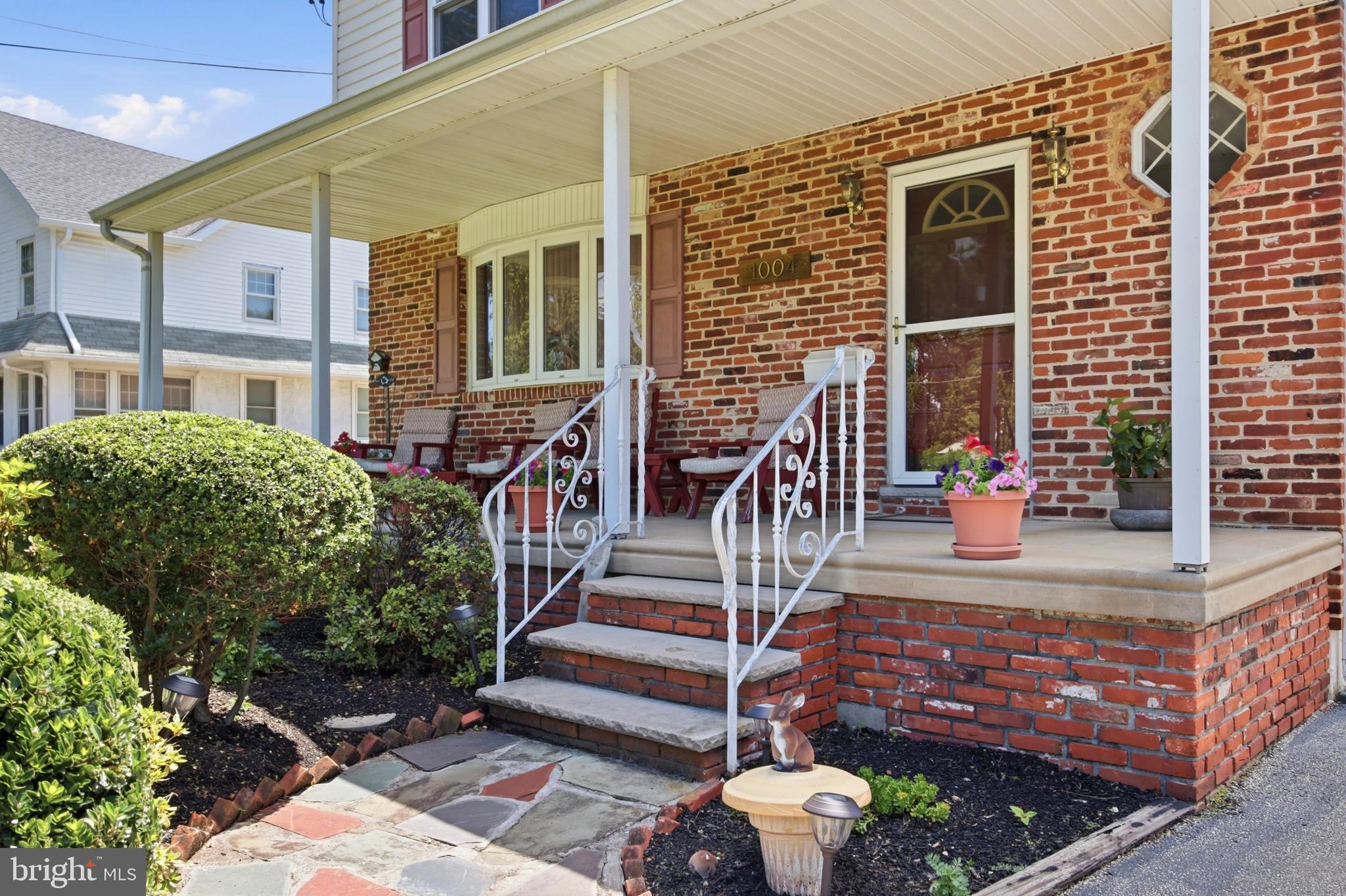 1004 Green Lane Secane, PA 19018 - Photo 4 of 49 a front view of a house with street