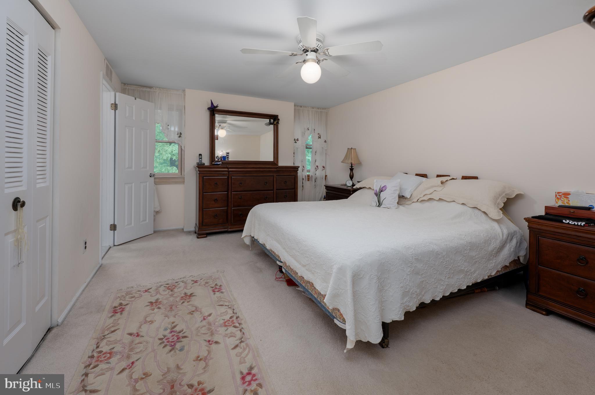 2 Wicklow Drive Tabernacle, NJ 08088 - Photo 14 of 21 a bedroom with a bed and a chandelier
