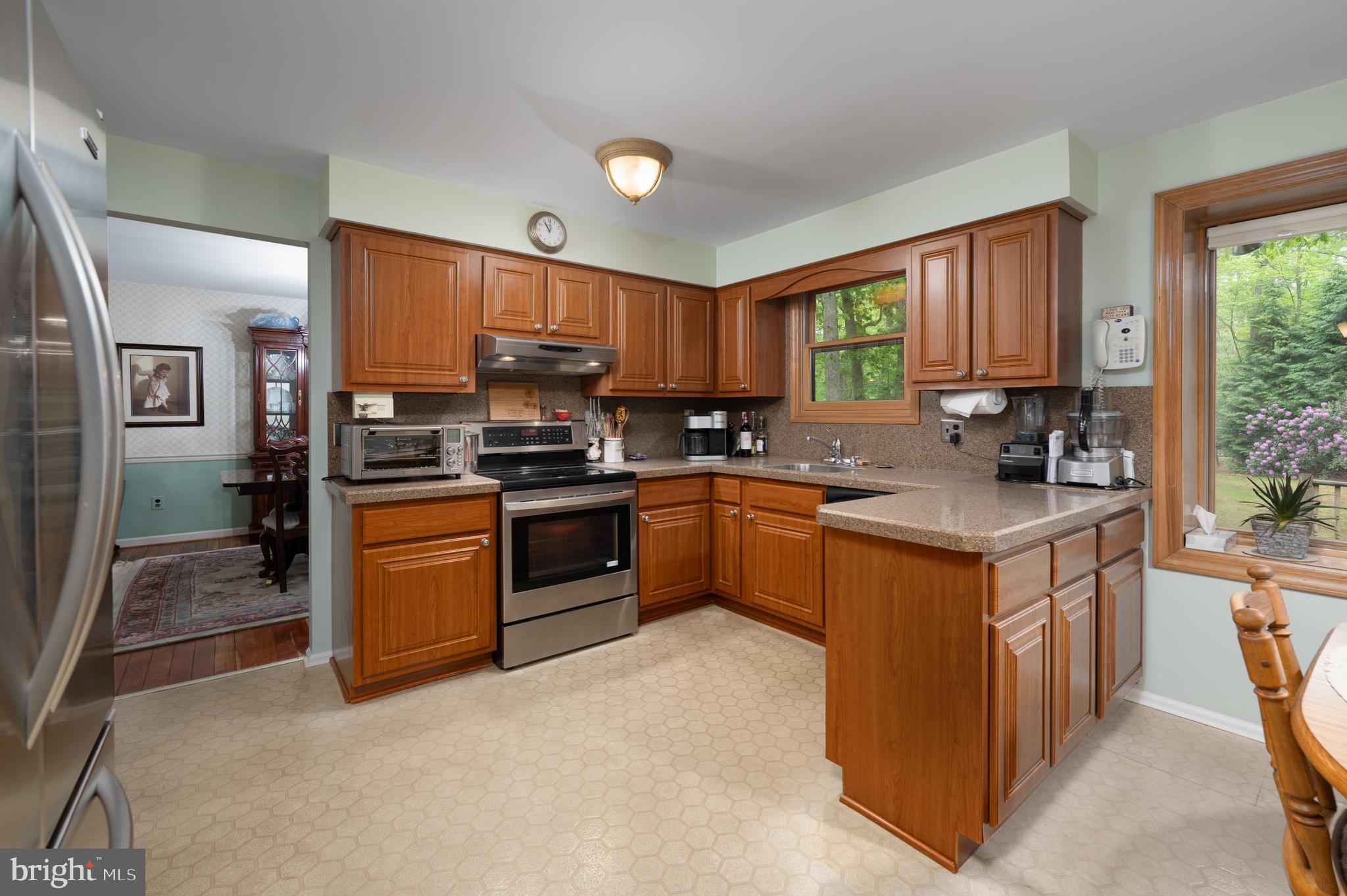 2 Wicklow Drive Tabernacle, NJ 08088 - Photo 9 of 21 a kitchen with granite countertop a stove top oven a sink dishwasher a refrigerator and cabinets with wooden floor