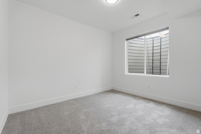 653 East Vandalay Lane Draper, UT 84020 - Photo 37 of 61 Room with light gray carpet flooring and white baseboards