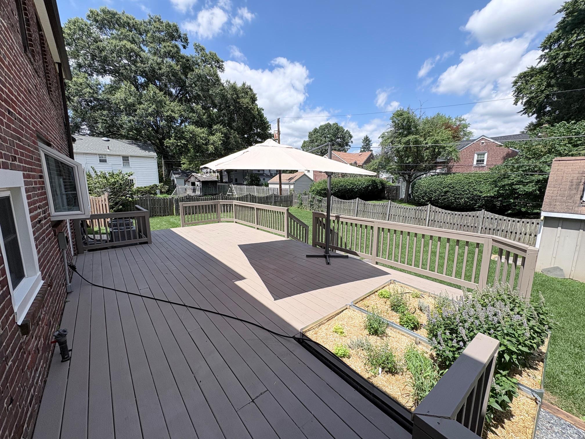 418 East Country Club Lane Wallingford, PA 19086 - Photo 49 of 60 Freshly painted deck with garden bed