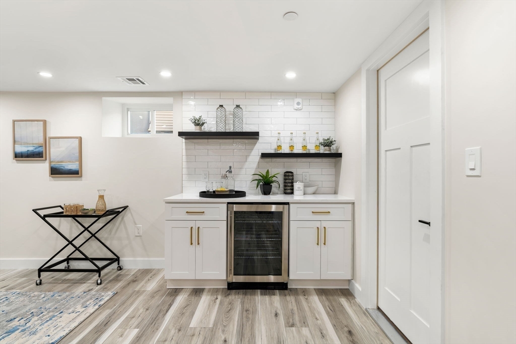 10 Marion Road, Unit 1 Belmont, MA 02478 - Photo 17 of 26 a kitchen with a sink cabinets and stainless steel appliances