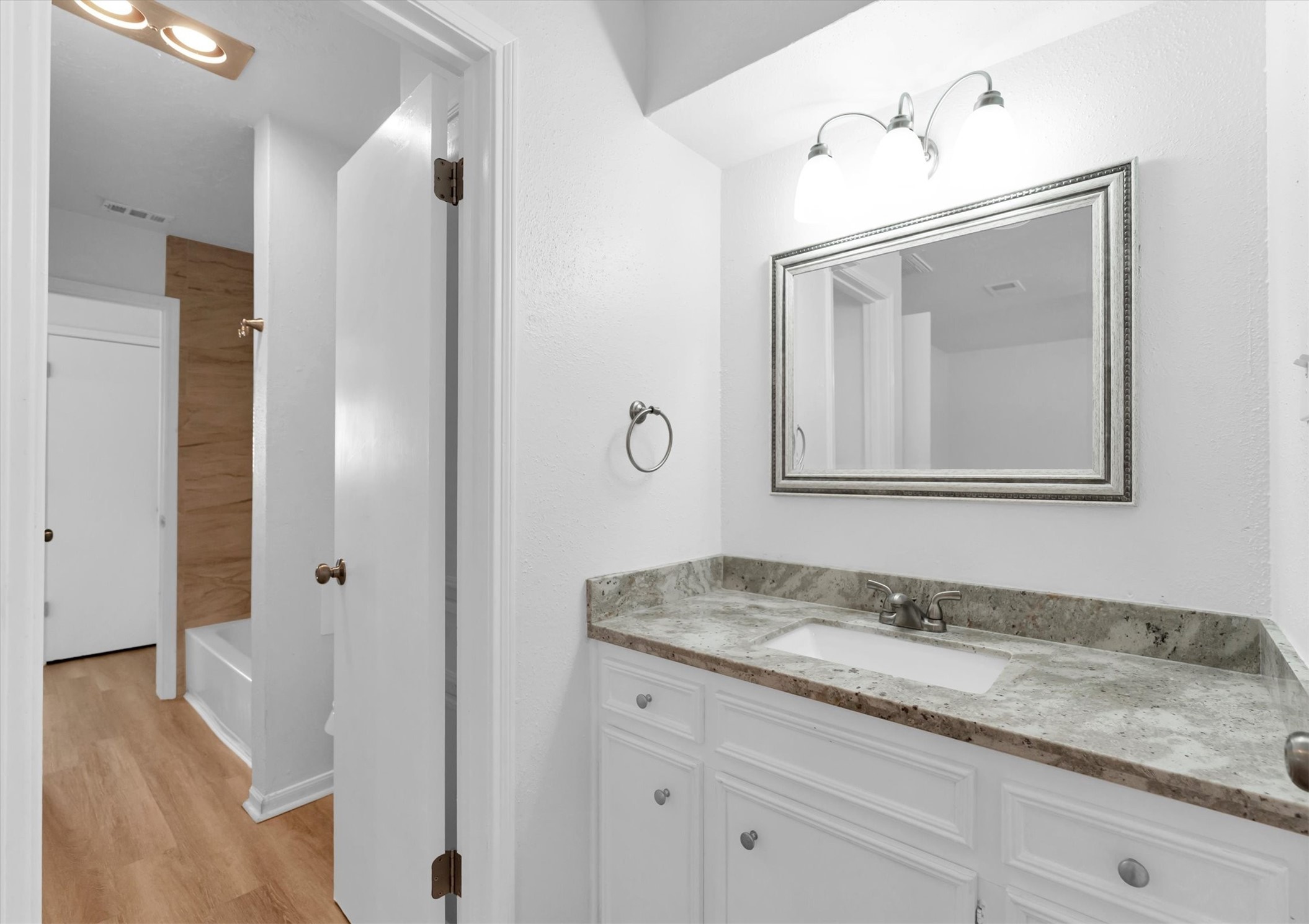 1101 Wilson Drive Rosenberg, TX 77471 - Photo 24 of 38 VIEW OF REMODELED BATH WITH NEW TOILET & BATH TUB!
