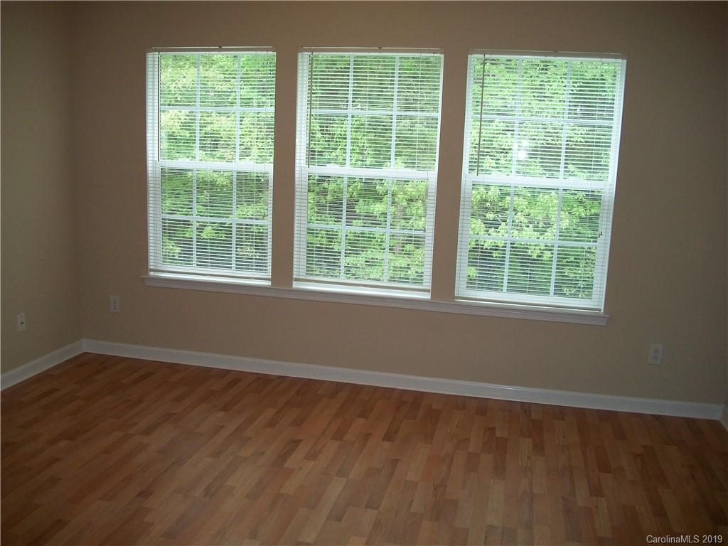 6646 Rothchild Drive Charlotte, NC 28270 - Photo 12 of 23 an empty room with a window