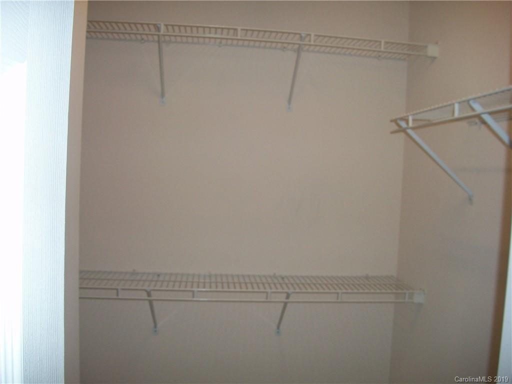 6646 Rothchild Drive Charlotte, NC 28270 - Photo 16 of 23 a view of a room with racks on the wall