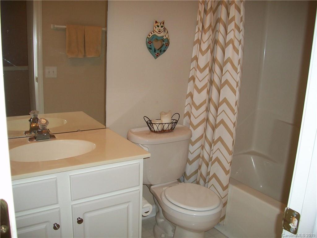 6646 Rothchild Drive Charlotte, NC 28270 - Photo 20 of 23 a bathroom with a sink and a toilet