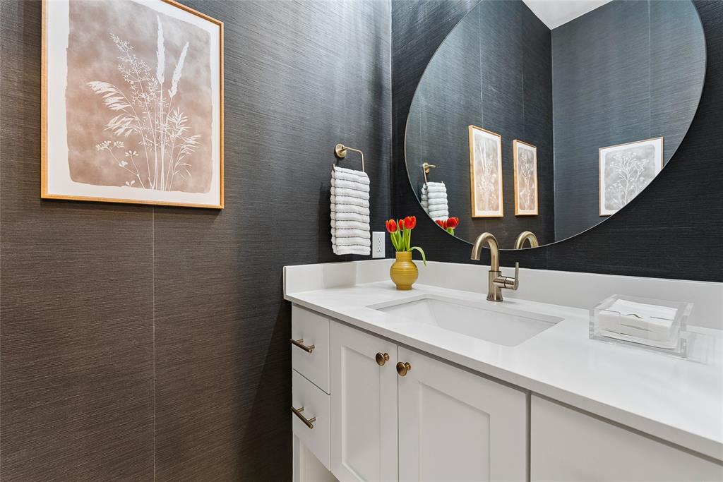 3922 Redding Row Dallas, TX 75220 - Photo 11 of 35 a bathroom with a sink and a mirror