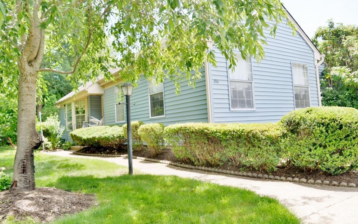 171 Concordia Circle, Unit C Monroe Township, NJ 08831 - Photo 1 of 13 a view of a house with a backyard