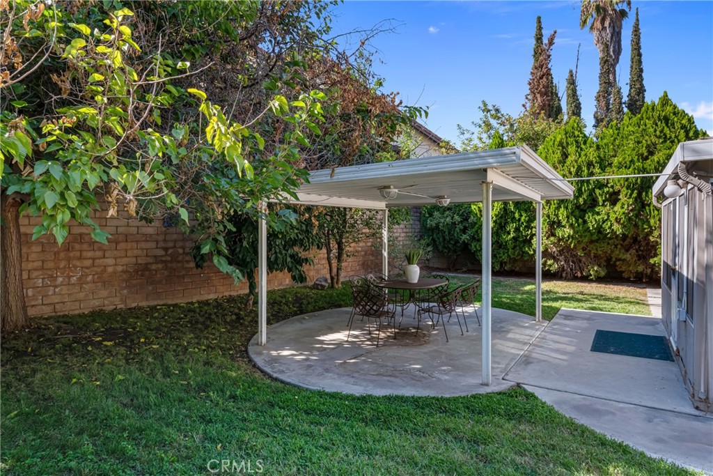 5165 Pearblossom Drive Riverside, CA 92507 - Photo 11 of 75 a view of a park with a slide and a lake view