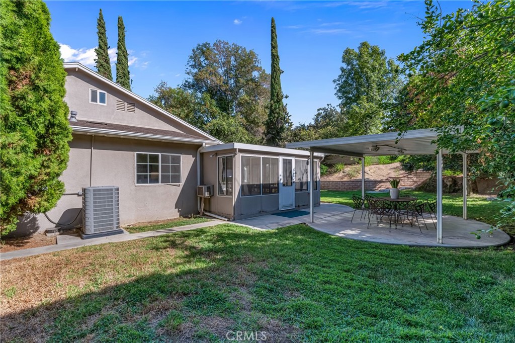 5165 Pearblossom Drive Riverside, CA 92507 - Photo 14 of 75 front view of a house with a yard