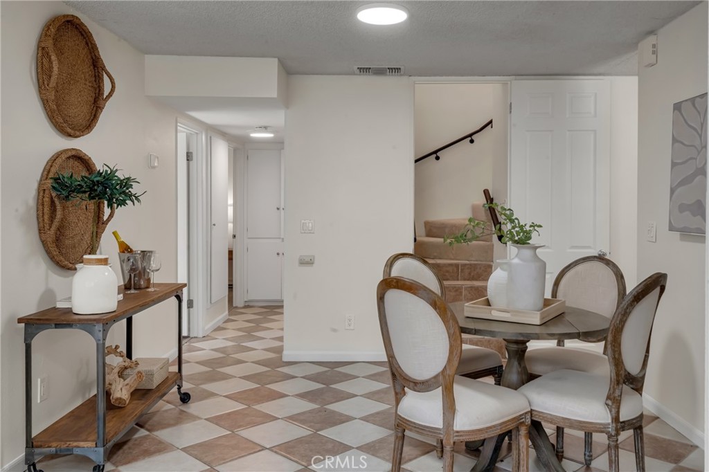 5165 Pearblossom Drive Riverside, CA 92507 - Photo 25 of 75 a view of a workspace room with furniture and mirror