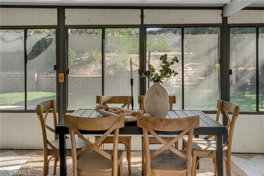5165 Pearblossom Drive Riverside, CA 92507 - Photo 29 of 75 a dining room with furniture window and outside view