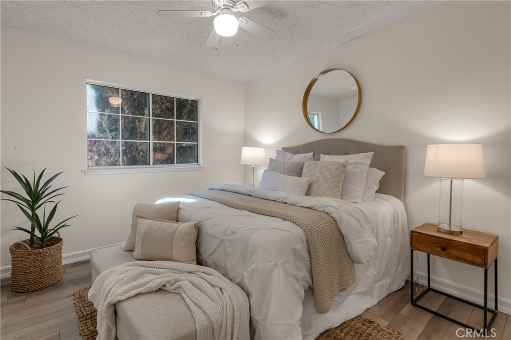 5165 Pearblossom Drive Riverside, CA 92507 - Photo 36 of 75 a bedroom with a bed and a window