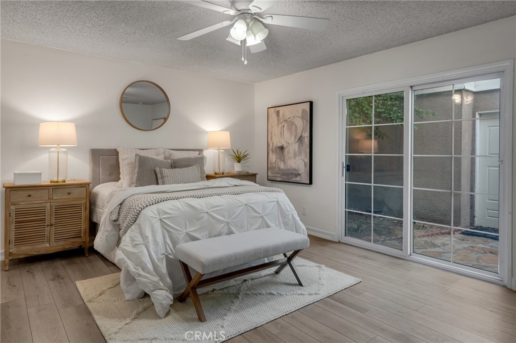 5165 Pearblossom Drive Riverside, CA 92507 - Photo 43 of 75 a bed room with a bed and a window