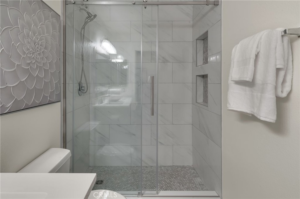 5165 Pearblossom Drive Riverside, CA 92507 - Photo 46 of 75 a bathroom with a shower