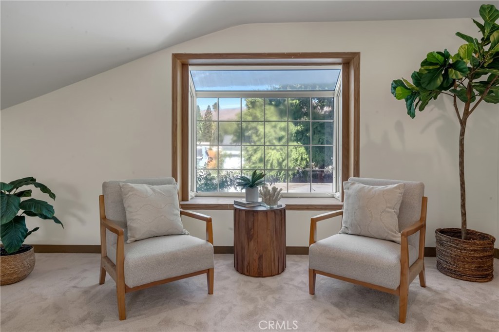 5165 Pearblossom Drive Riverside, CA 92507 - Photo 48 of 75 a living room with furniture and a potted plant