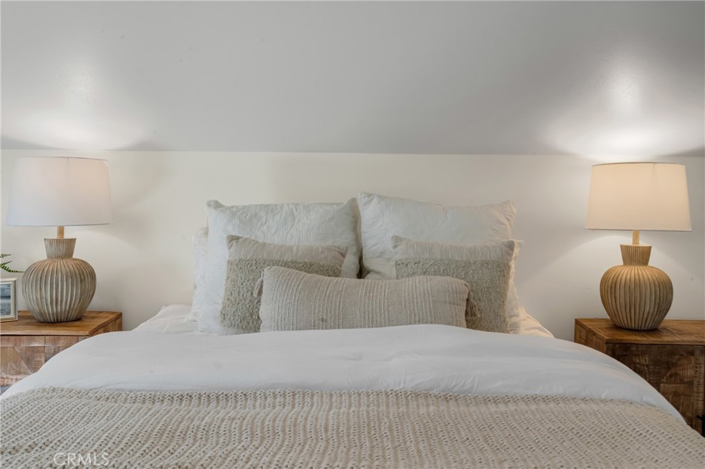 5165 Pearblossom Drive Riverside, CA 92507 - Photo 50 of 75 a bedroom with a bed and window