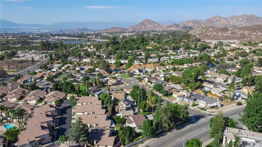 5165 Pearblossom Drive Riverside, CA 92507 - Photo 67 of 75 an aerial view of residential houses with outdoor space and trees