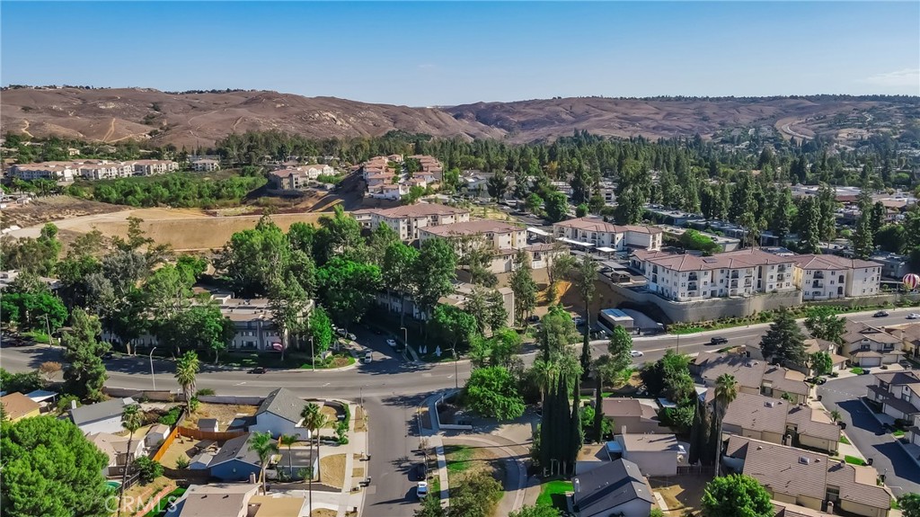 5165 Pearblossom Drive Riverside, CA 92507 - Photo 71 of 75 a view of a city with mountains in the background