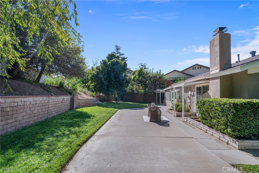 5165 Pearblossom Drive Riverside, CA 92507 - Photo 8 of 75 a front view of a house with garden